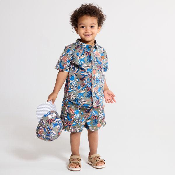 شورت قطني أخضر كاكي اللون عليه رسوم حيوانات للطفل الرضيع